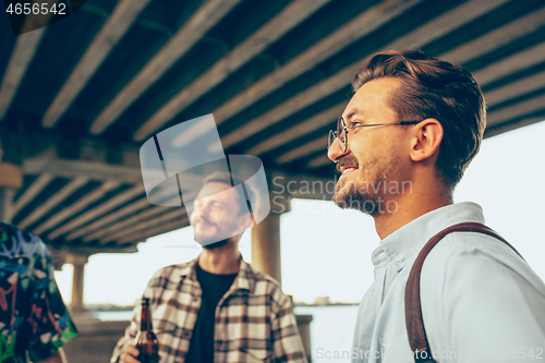 Image of Group of friends celebrating, resting, having fun and party in summer day