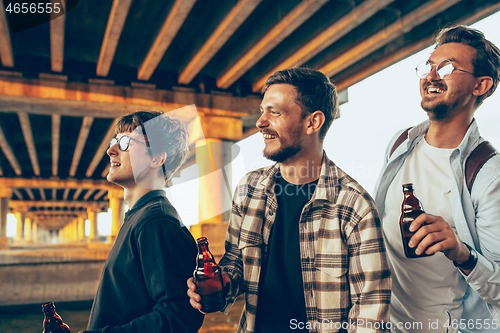 Image of Group of friends celebrating, resting, having fun and party in summer day