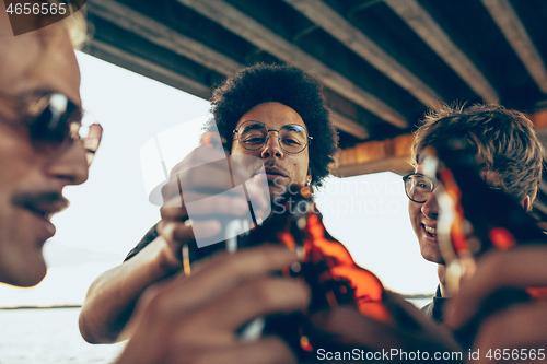 Image of Group of friends celebrating, resting, having fun and party in summer day