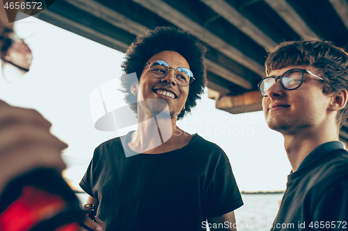 Image of Group of friends celebrating, resting, having fun and party in summer day