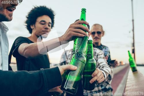 Image of Group of friends celebrating, resting, having fun and party in summer day