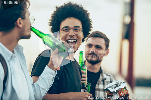 Image of Group of friends celebrating, resting, having fun and party in summer day