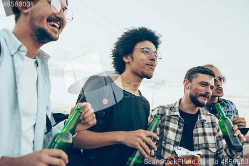 Image of Group of friends celebrating, resting, having fun and party in summer day