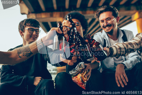 Image of Group of friends celebrating, resting, having fun and party in summer day