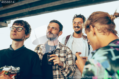 Image of Group of friends celebrating, resting, having fun and party in summer day