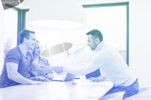 Image of Startup Business Team At A Meeting at modern office building