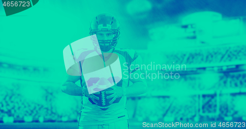 Image of American Football Player isolated on big modern stadium field