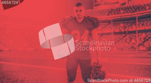 Image of American Football Player isolated on big modern stadium field