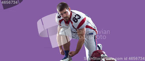 Image of portrait of confident American football player