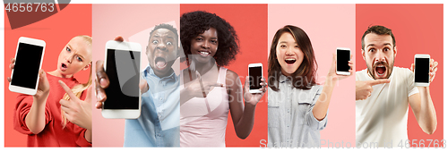 Image of The collage about surprised, smiling, happy, astonished people showing blank screen of mobile phones