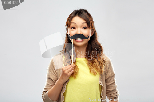 Image of happy asian woman with big black mustache