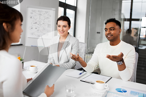 Image of recruiters having job interview with employee