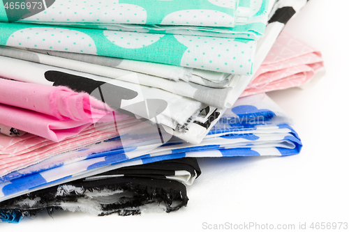 Image of heap of cotton fabric material isolated on white