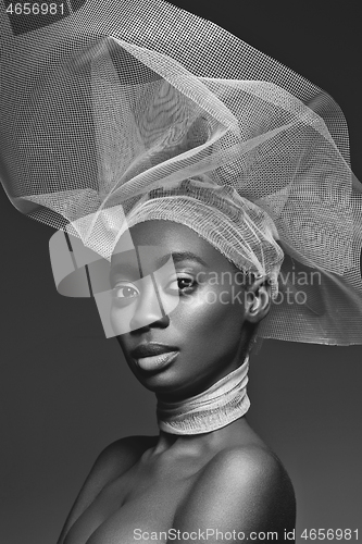 Image of Beautiful african girl with veil hat