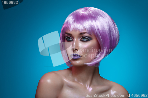 Image of Beautiful girl in purple wig