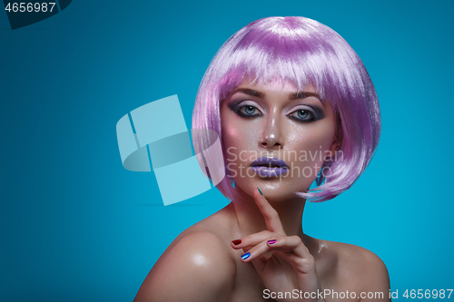 Image of Beautiful girl in purple wig