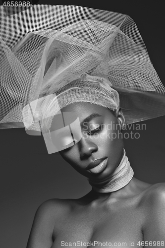 Image of Beautiful african girl with veil hat