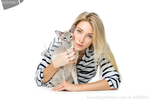 Image of Beautiful girl with oriental siam cat