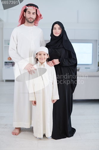 Image of portrait of young happy arabian muslim family