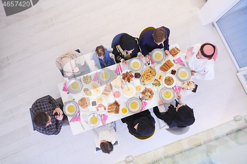 Image of muslim family having a Ramadan feast top view