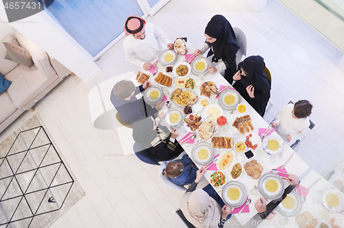 Image of muslim family having a Ramadan feast top view