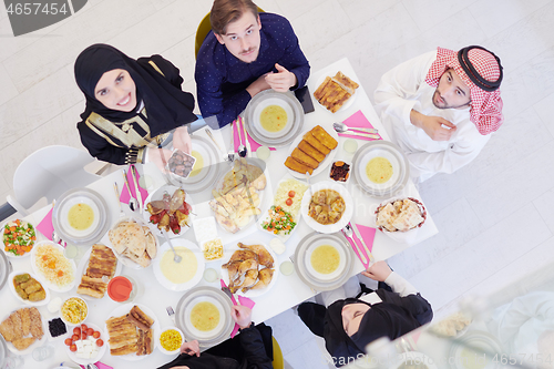Image of muslim family having a Ramadan feast