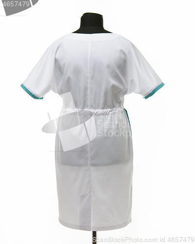 Image of Female medical gown on a mannequin for clothes on a white background, rear view