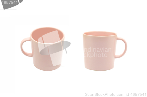 Image of Pink ceramic cups on white background