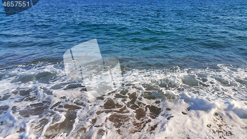 Image of Sea waves with white foam 