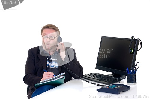 Image of Businessman on desk 