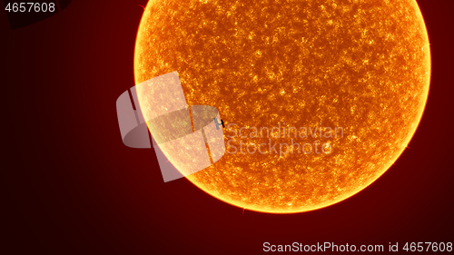 Image of sun with International Space Station