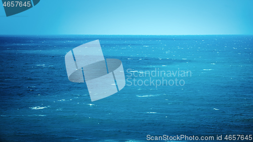 Image of blue sky and the ocean