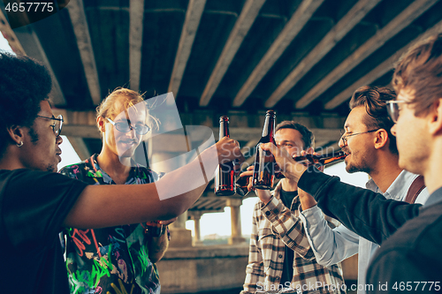 Image of Group of friends celebrating, resting, having fun and party in summer day