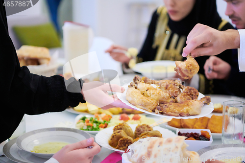 Image of muslim family having a Ramadan feast