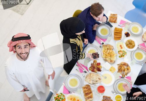 Image of muslim family having a Ramadan feast