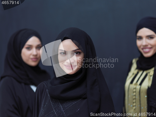 Image of portrait of beautiful muslim women in fashionable dress