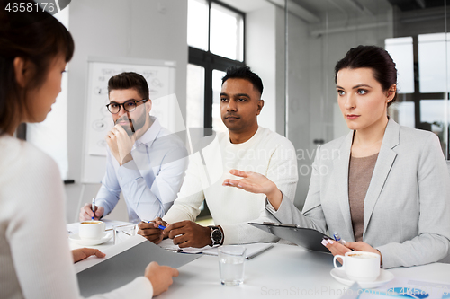 Image of recruiters having job interview with employee