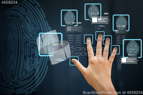 Image of hand on touch screen scanning fingerprints