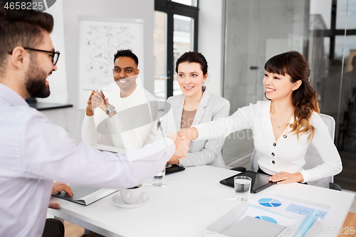 Image of recruiters having interview with employee