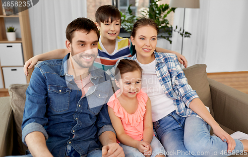 Image of portrait of happy family at home