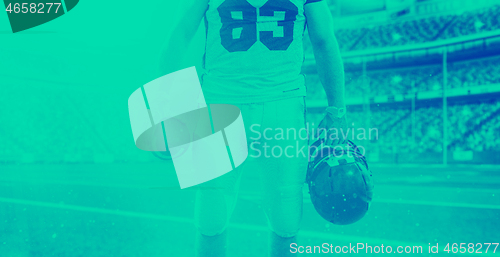 Image of closeup American Football Player isolated on big modern stadium