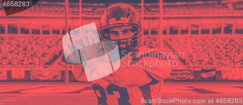 Image of american football player throwing ball