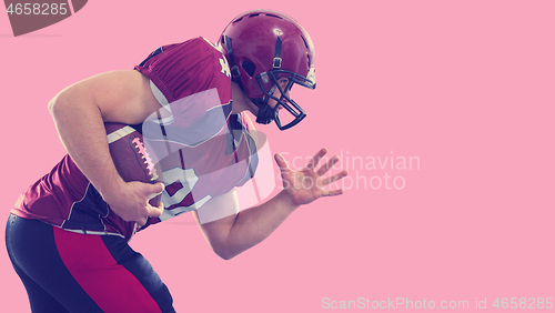 Image of American football Player running with the ball