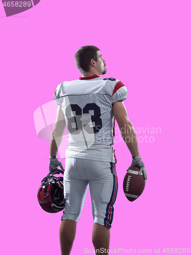 Image of American Football Player isolated on colorful background