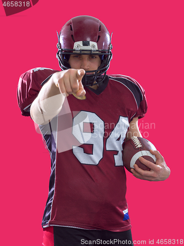 Image of portrait of confident American football player