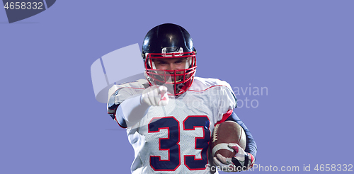 Image of portrait of confident American football player