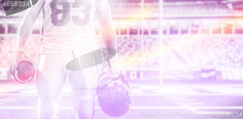 Image of closeup American Football Player isolated on big modern stadium