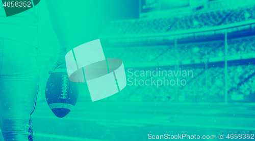 Image of closeup American Football Player isolated on big modern stadium