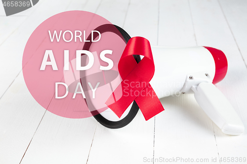 Image of Aids Awareness Sign Red Ribbon. World Aids Day concept.