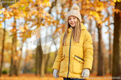 Image of happy girl at autumn park